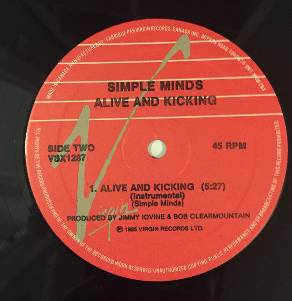 Alive & Kicking Simple Minds