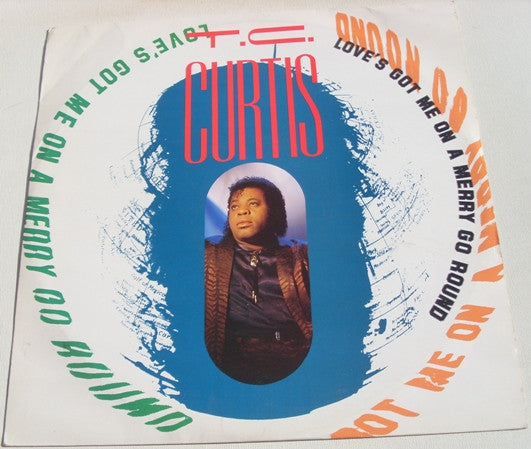Love's Got Me On A Merry Go Round T.C. Curtis