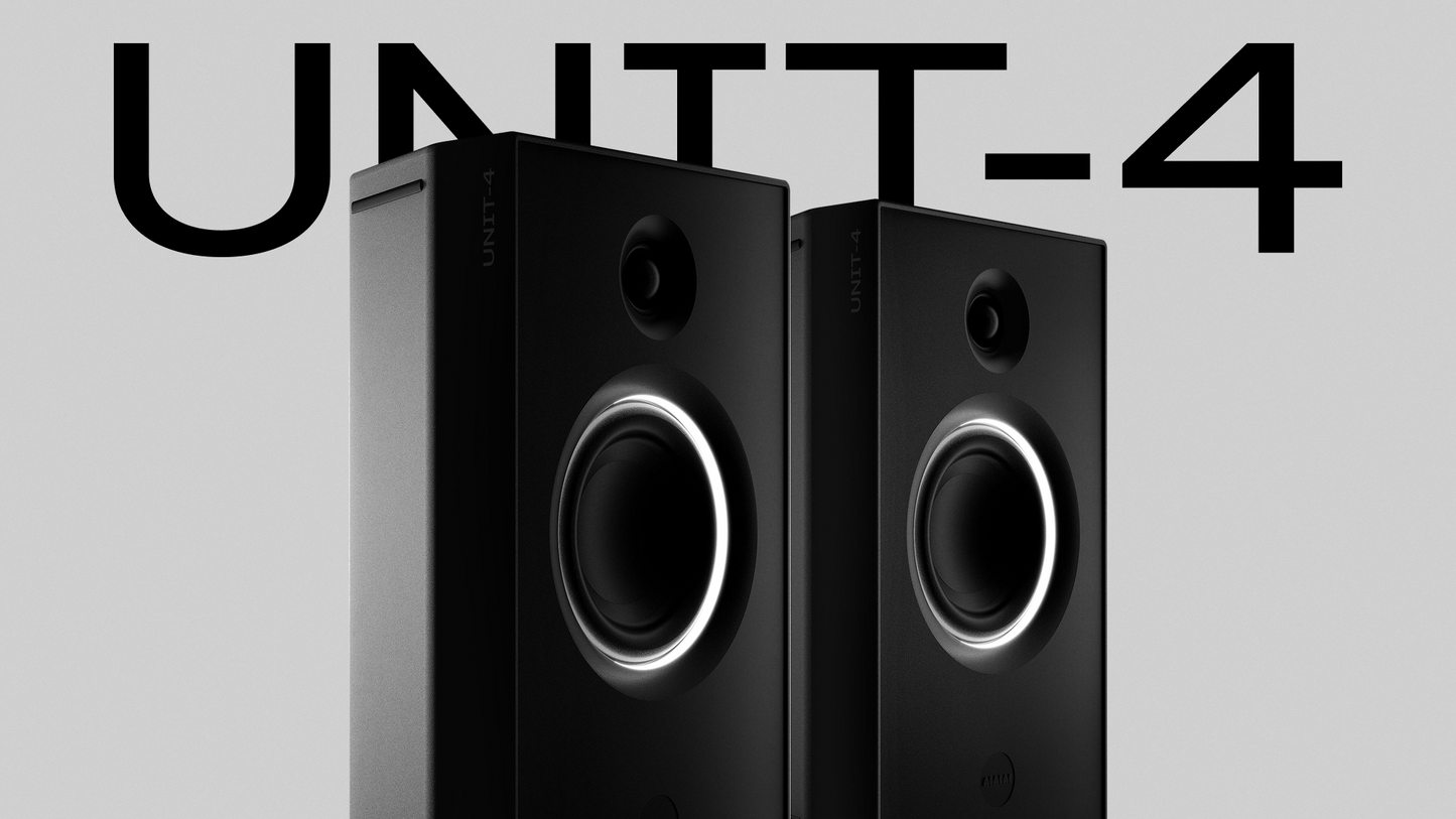 Pair of AIAIAI Wireless+ Active 2-Way Studio Monitors, UNIT-4 model, with black enclosures and control panels on front.
